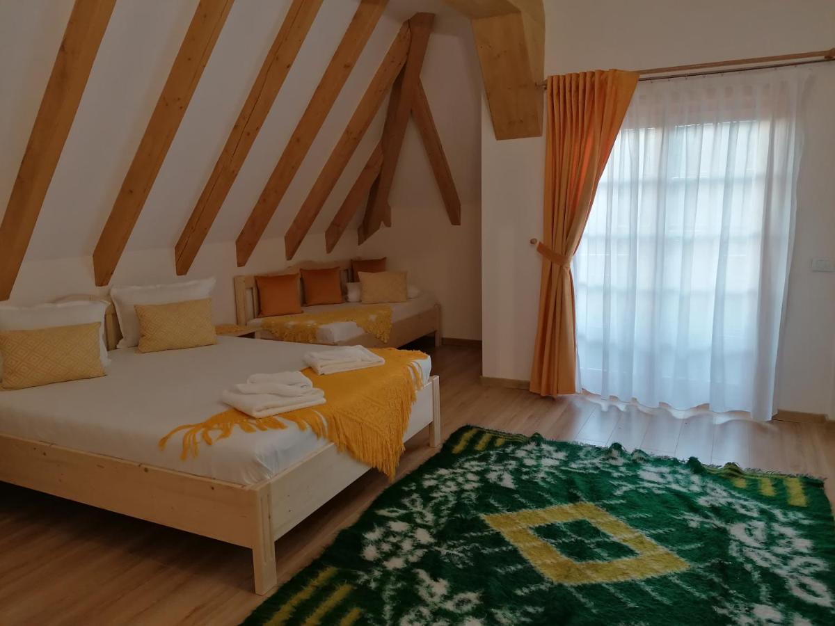 Pensiunea Casuta Din Deal Moisei Rum bild