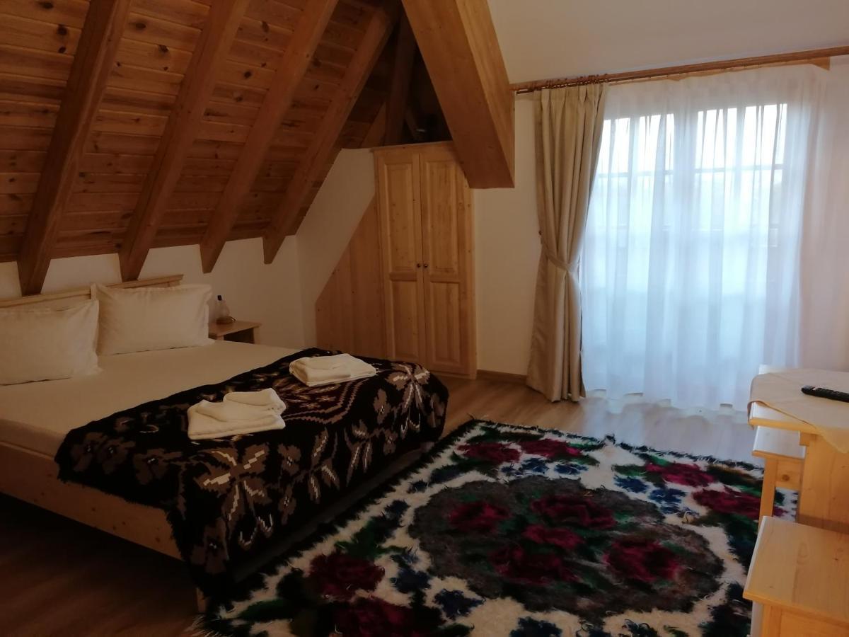 Pensiunea Casuta Din Deal Moisei Rum bild